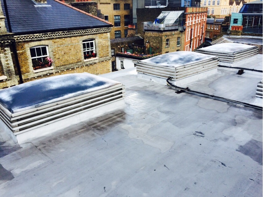 Commercial flat roof with newly installed dome rooflights in Derby